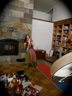 Brenda drumming at Moving Mandala